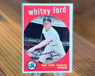 This lot features a collectible 1959 Topps baseball card featuring New York Yankees pitcher Whitey Ford, numbered #430 in the set.