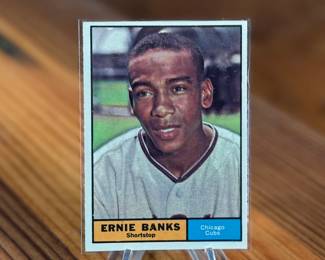 This lot features a vintage 1961 Topps #350 Ernie Banks Chicago Cubs baseball card.
