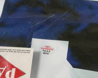 This lot features a signed jersey (with tags) by former American professional soccer player. Authenticated as shown in photos.