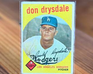 This lot features a 1959 Topps baseball card featuring Hall of Fame pitcher Don Drysdale of the Los Angeles Dodgers. 