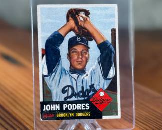 This lot features a vintage 1953 Topps Johnny Podres rookie baseball card (#263). 