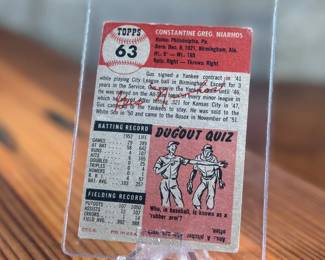 This lot features a vintage 1953 Topps baseball card featuring catcher Gus Niarhos of the Boston Red Sox. 