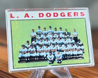This lot features a 1964 Topps team card of the Los Angeles Dodgers, card #531.