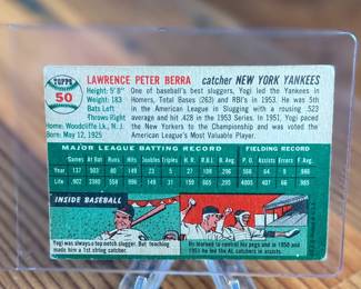 This lot features a vintage 1954 Topps Yogi Berra #50 baseball card. 