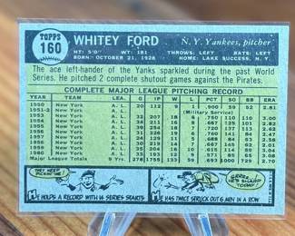 This lot features a collectible 1961 Topps #160 baseball card featuring Whitey Ford of the New York Yankees. 