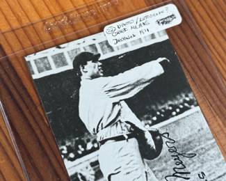 This lot features a collectible vintage black-and-white photograph or postcard featuring baseball catcher Chief Meyers in a throwing stance at the Polo Grounds. The image is dated 1909 and features his name, a printed signature, and a handwritten-style note.