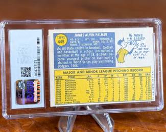 This lot features a 1970 Topps Baseball trading card featuring Jim Palmer of the Baltimore Orioles. It is graded as Excellent+ 5.5 by Certified Sports Guaranty (CSG). 