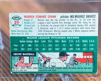This lot features a collectible 1954 Topps #20 Warren Spahn baseball card featuring the Hall of Fame Milwaukee Braves pitcher. 