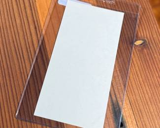 This lot features a collectible vintage black-and-white photograph or postcard featuring baseball catcher Chief Meyers in a throwing stance at the Polo Grounds. The image is dated 1909 and features his name, a printed signature, and a handwritten-style note.