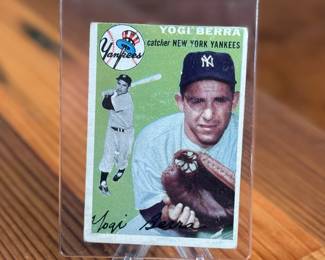 This lot features a vintage 1954 Topps Yogi Berra #50 baseball card. 