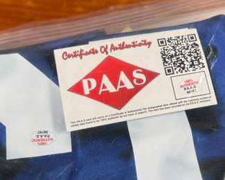 This lot features a signed jersey (with tags) by former American professional soccer player. Authenticated as shown in photos.