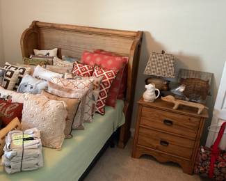 Magnolia Homes furniture with pillows and pigs!