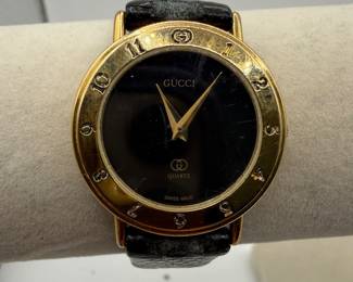 Lot #1 Vintage Gucci Swiss Made Quartz Watch β Gold Tone Bezel with Logo Markers, Black Dial Designer Luxury Timepiece