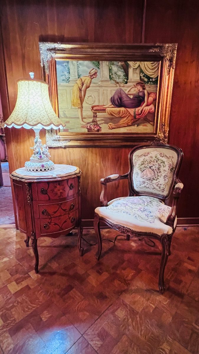 Victorian Lamp, Chair, Table ,   with a nice piece of art work on the wall,