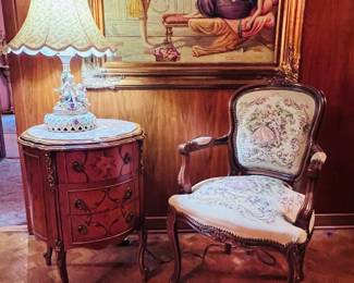 Victorian Lamp, Chair, Table ,   with a nice piece of art work on the wall,