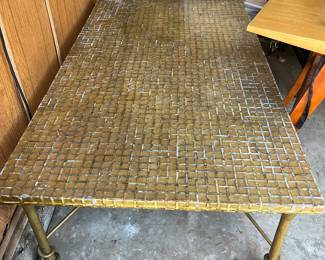 vintage-style coffee table featuring a rectangular top covered in a golden mosaic tile pattern Metal
