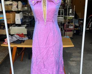 Purple iridescence maxi dress with items for sale in background 