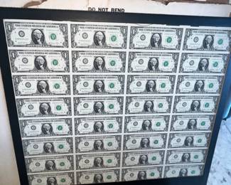 DOZENS OF SHEETS OF UNCUT PAPER MONEY