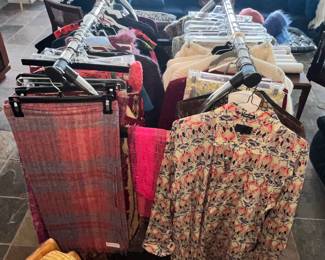 THERE ARE RACKS OF FINE CLOTHING ALL OVER!