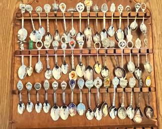 WALL RACK LOADED WITH COLLECTOR SPOONS
