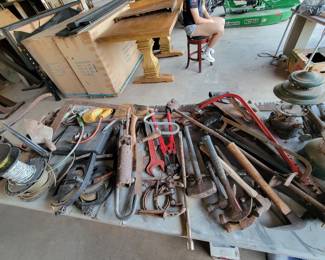 Credenzas, dining table, hand tools, saws many vintage antique, lantern, twine, rope, power tools