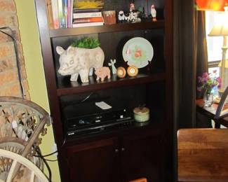 nice tall bookcase with doored storage