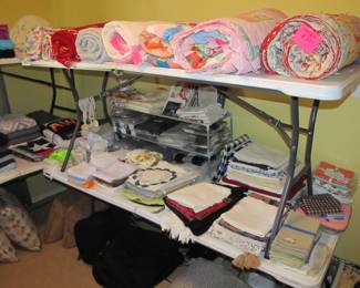 we have lots of beautiful linens including VTG handmade quilts