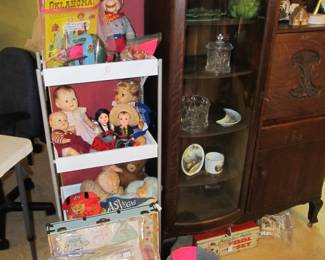 full display with ATQ dolls, doll clothes, and more