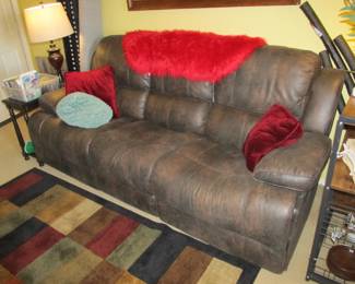 Purchased in 2025, this newer duel powered leather recliner