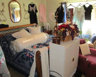 big master full of beautiful furniture, ladies' fashions, and more.