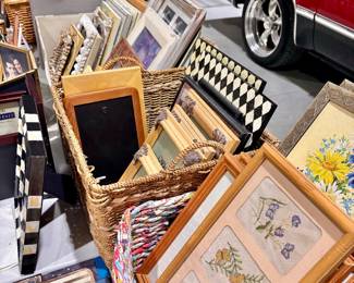 Tons and tons of picture frame and some needlepoint hanging wall art and other various artwork
