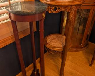 Marble pedestal tables