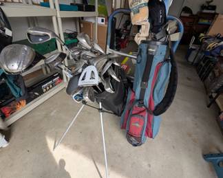 Lots of golf equipment 