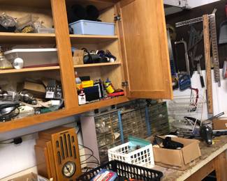 Small tool cabinets, nuts, bolts, screws, parts, cleaners, paint and supplies, light bulbs, hardware.  