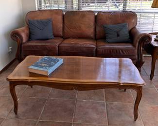 leather couch, solid wood coffee table