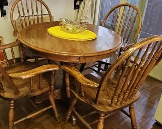 Oak Round Dining Table with Four Chairs by Richardson Brothers Co.