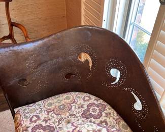 Details on artisan made metal chaise lounge