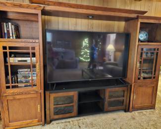 large entertainment center, TV and not available 