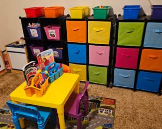 lots of toy storage solutions and play table 