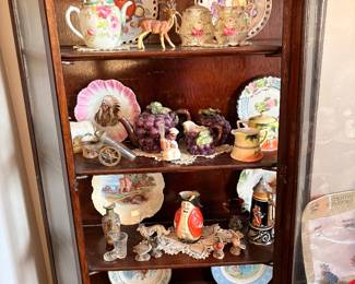 Curved glass curio  cabinet