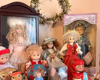 Dolls, indian girl bobblehead and Chiefs bobblehead