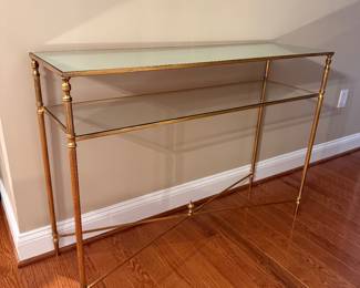 Mirrored brass console table
