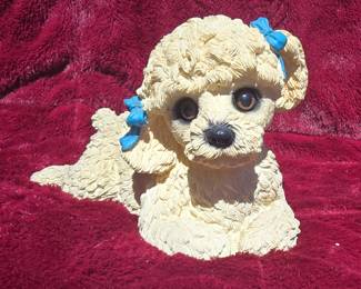 Awww... cute poodle marked PPL1994 Wellington. 