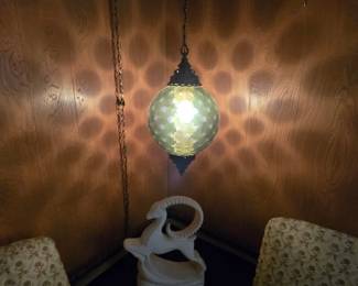 Shadow pattern cast by the vintage swag lamp