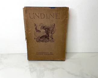 Lot 841  Arthur Rackham Illustrator  Undine  Hardcover Book  London. William Heinemann. 1911 2nd Printing  Dust Jacket Torn  Color Plates