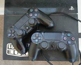 Playstation 4 with controllers