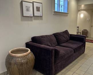 Upholstered Sofa and Urn