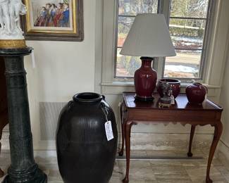 A blackened amphora.