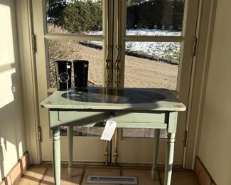 A small painted side table