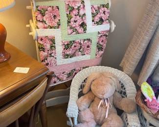 Handcrafted quilt, wicker child's rocker, plush